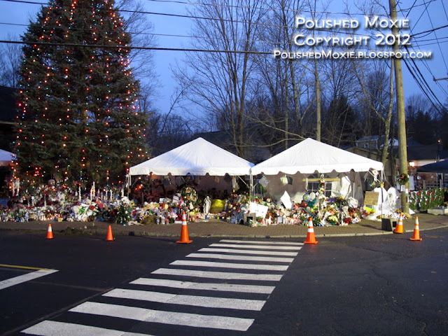 Click on the Sandy Hook memorials image to enlarge it in a new tab. Image of Sandy Hook Elementary School memorials.