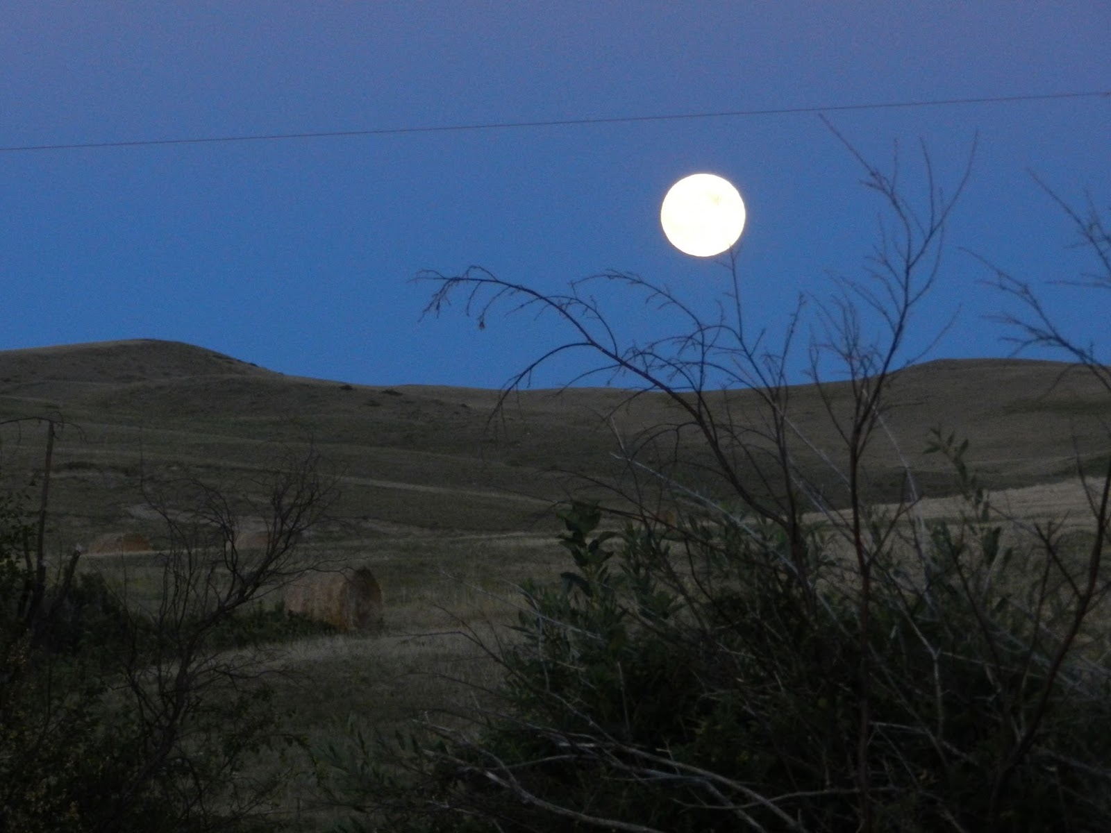 Along the Gradyent Moon Rise Over Montana