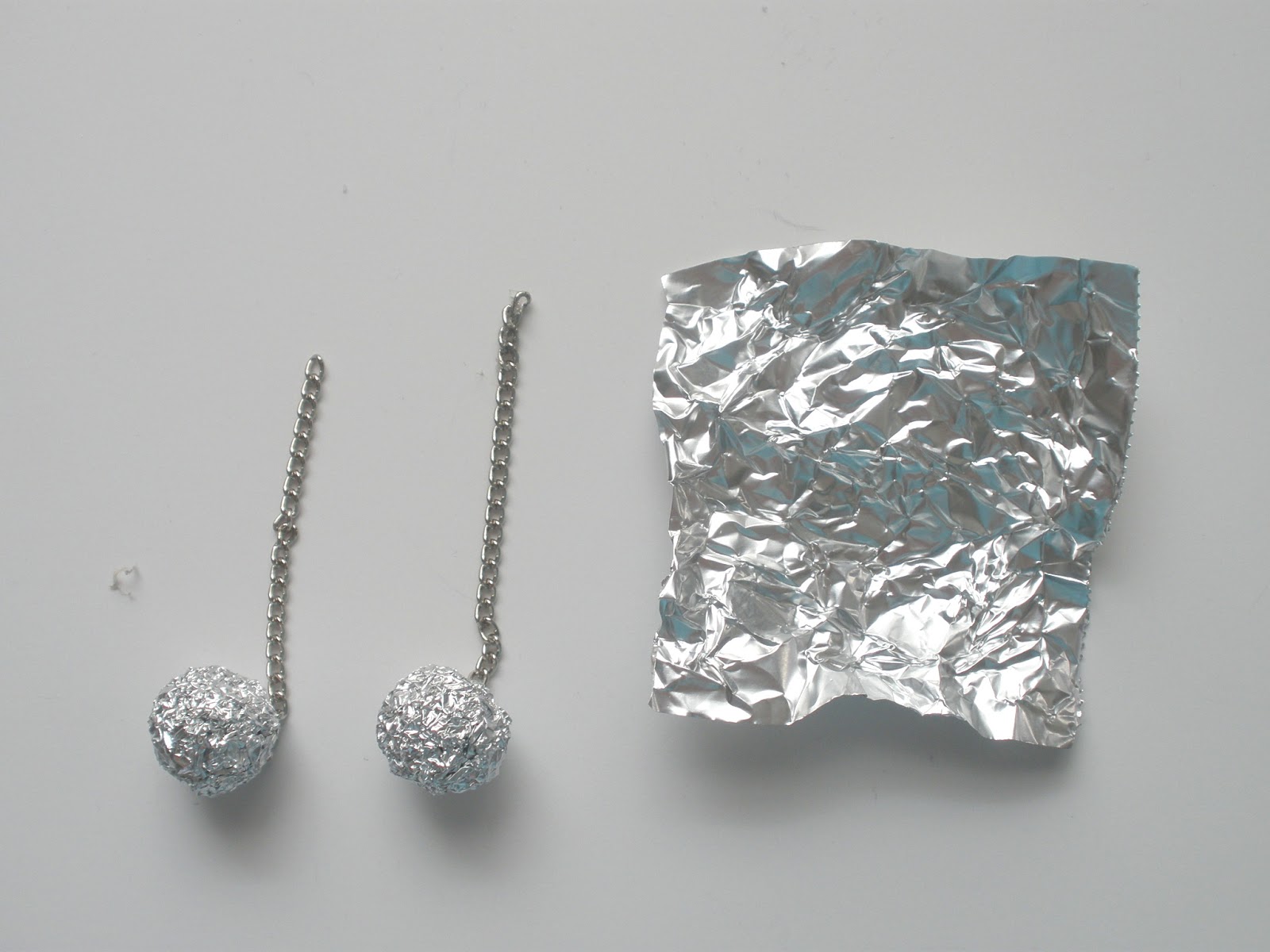 handmade by stacy vaughn tin foil earings