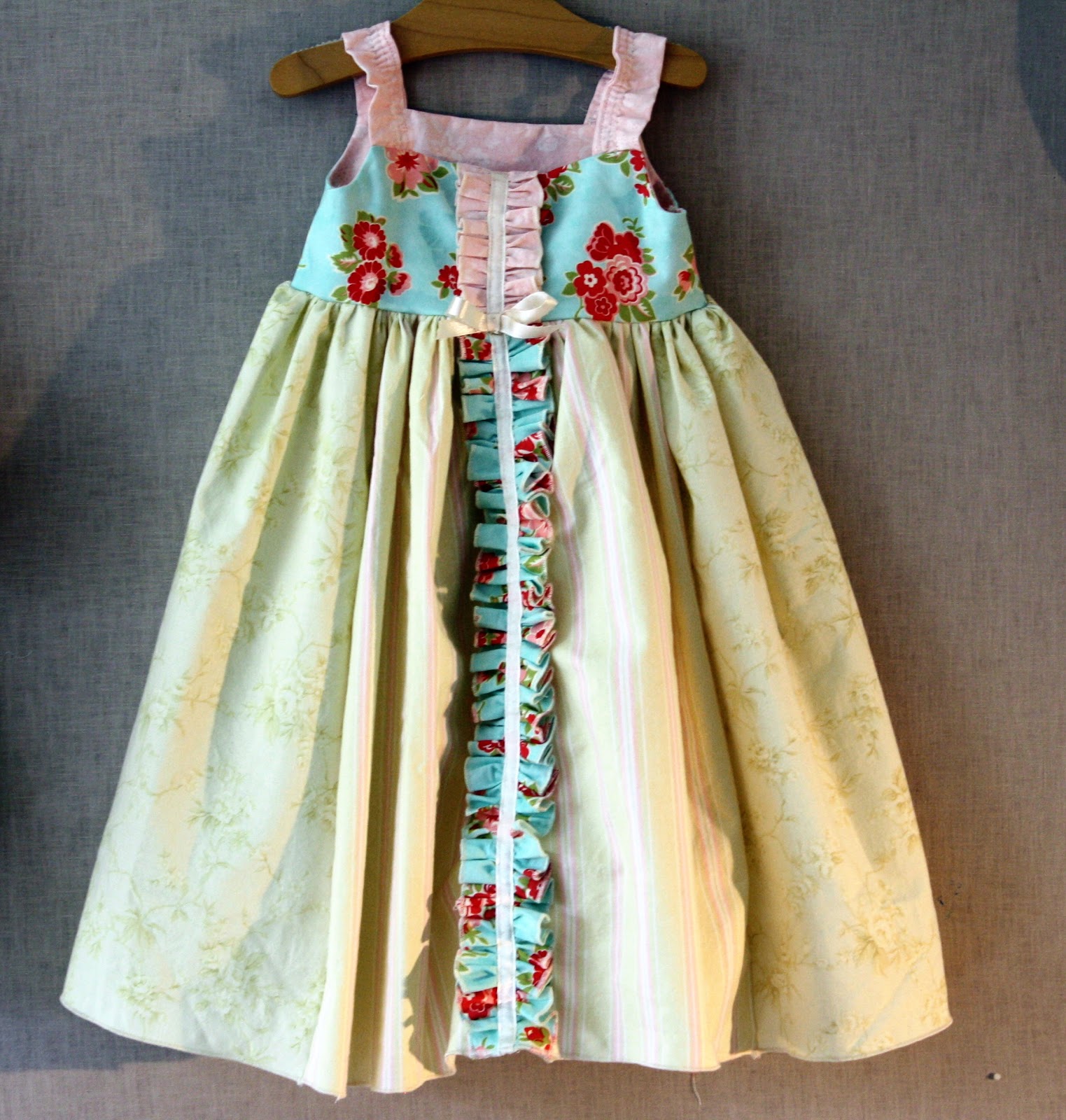 sew grown Quilted dress made from scrap fabric.