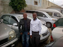 Tami with Mitchel From DRC after he bought a used Japanese VW Polo in Durban