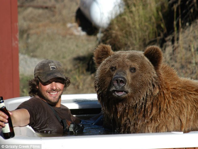 Brutus the Center Bear and redneck Russ Hertzog welcome you