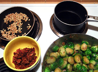 Sauteed Sprouts, Toasted Pine Nuts, Crispy Bacon, and Balsamic Reduction