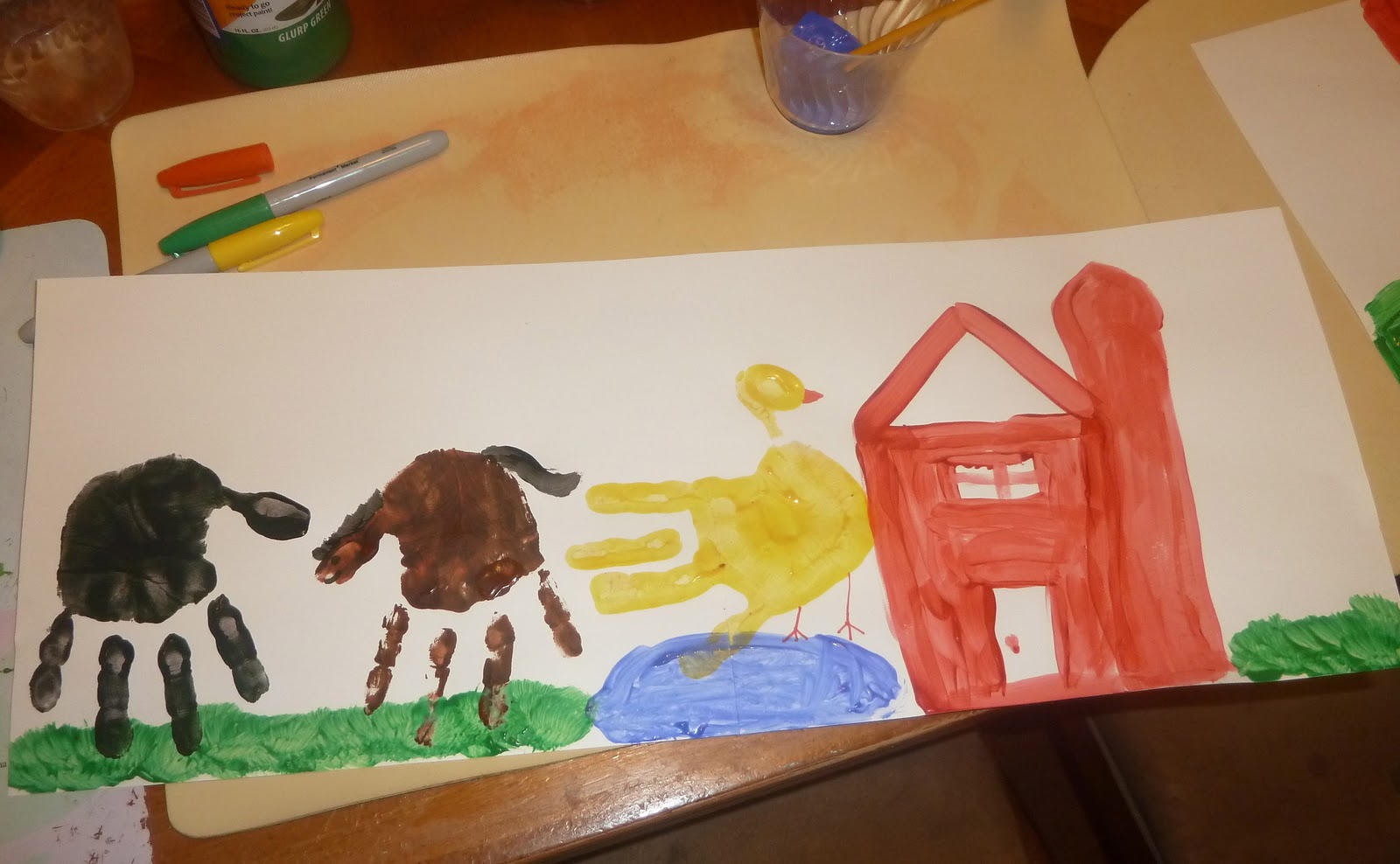 Add cotton balls to palm to make wool & add wiggly eye.