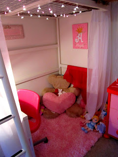 I also rehung some of the pictures that had been above Abby's old bed, to spots under her loft. All stuffed animal decorations are courtesy of Abby's interior design talents! :)