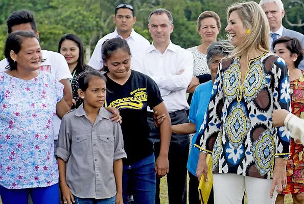 Queen Maxima, is greeted by the Garcia Family