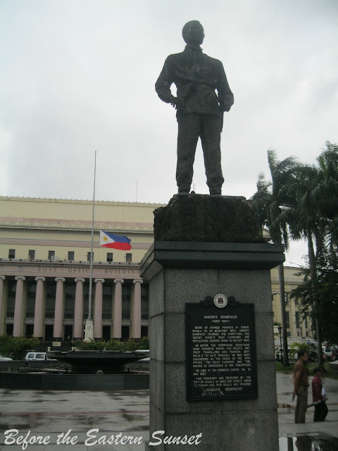 Statue of Andres Bonifacio with Manila Central Post Office at the background.