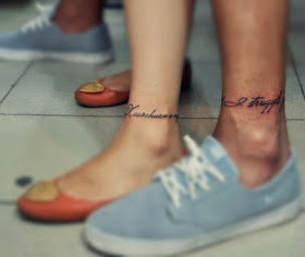 matching oath letters tattoo on the ankle