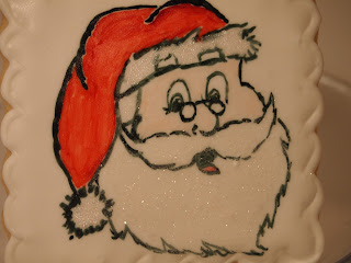 hand panted Santa cookies