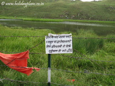 Warning board near the Lake Warning board near the Lake