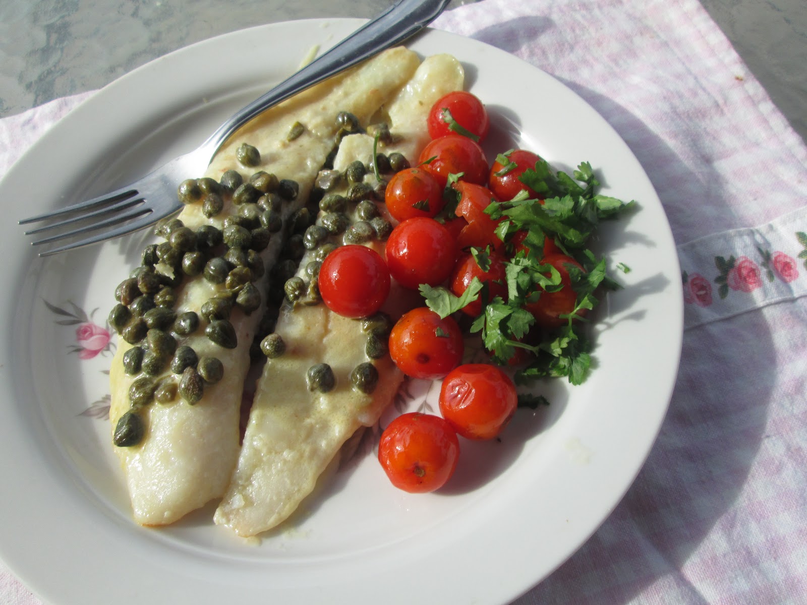Canela kitchen (gloria) Fish with capers sauce and cherry tomatoes