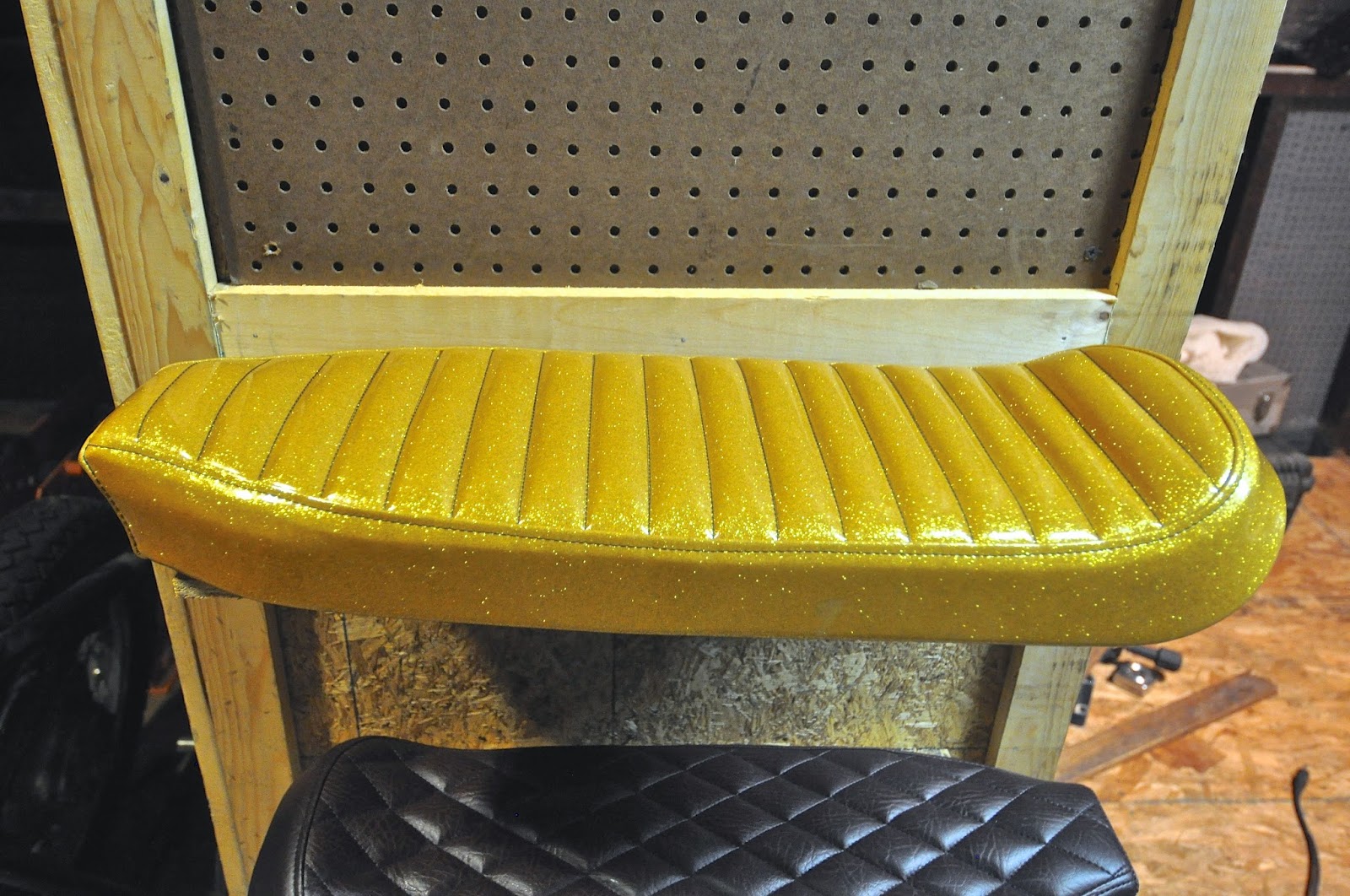 Counter Balance Motorcycles New Gold Metal Flake Tuck and Roll Seat in the shop!