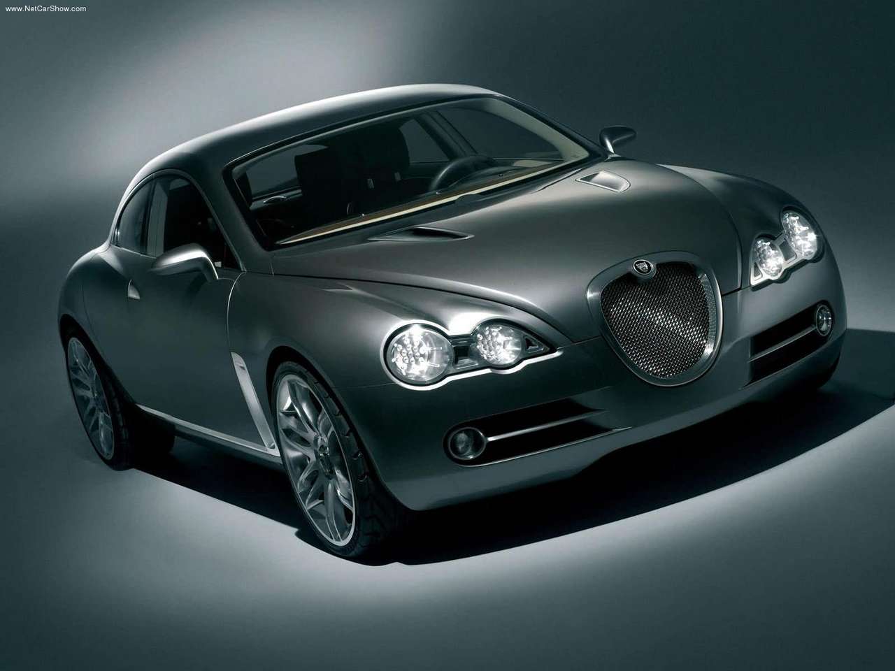 http://4.bp.blogspot.com/-kb_6BNWNp7Q/TbQ77dNgKII/AAAAAAAADI8/3F8B0fzGnEE/s1600/Jaguar-RD6_Concept_2003_1280x960_wallpaper_07.jpg