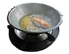 Chicken Deep Frying In Hot Oil In A Cast Iron Frying Pan Stock Photo,  Picture and Royalty Free Image. Image 17721959.