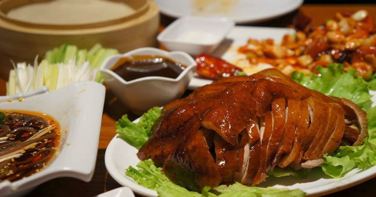 O PatoàPequim Site do Oriente