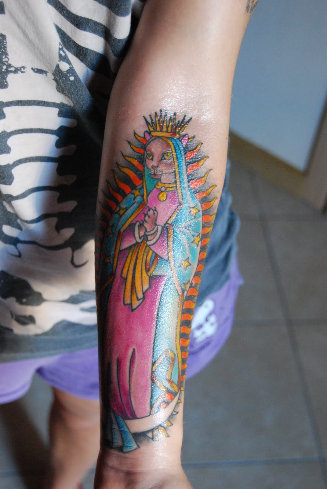 http://4.bp.blogspot.com/-kjdYQO_nOa4/TogYEBBJr3I/AAAAAAAAAUY/BzOqB-6QsnM/s1600/tattoo+madonna.jpg