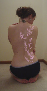 Tattooed Women Cherry Blossom tattoo on back body