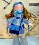 http://manualidades.facilisimo.com/blogs/ideas-diy/con-una-camiseta-vieja-se-puede-hacer-esta-bonita-muneca-de-tela_1332310.html