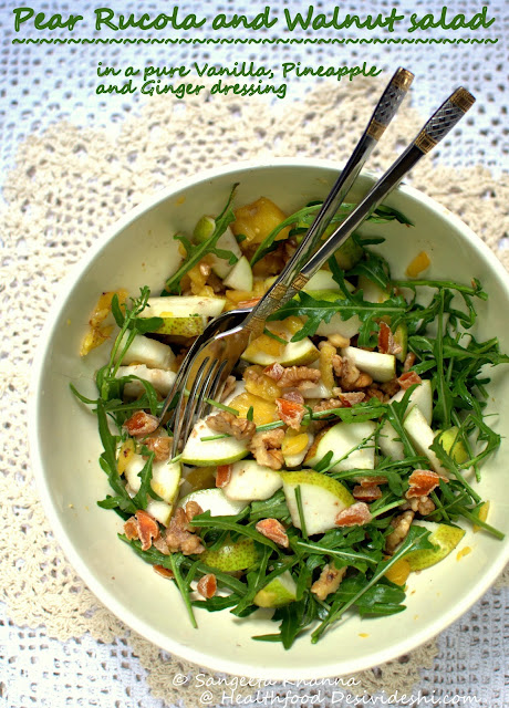 pear rucola and walnuts salad in pineapple vanilla dressing 