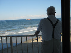 Not a bad room for no reservation... Fred's watching the dredge replace beach sand.