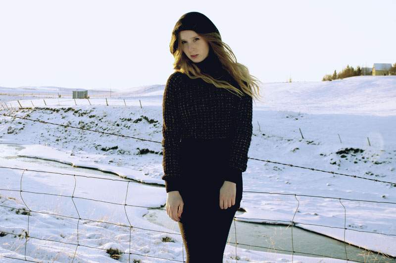 black snood, river island cropped black and gold jumper, black miss selfridge playsuit. iceland fashion