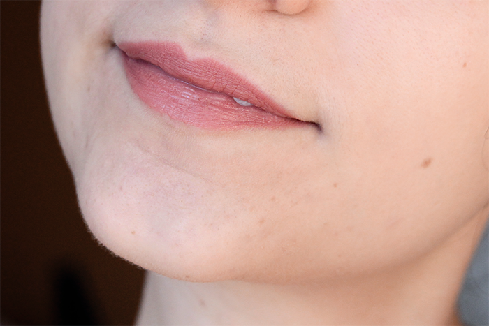 essence satin mauve swatch on lips