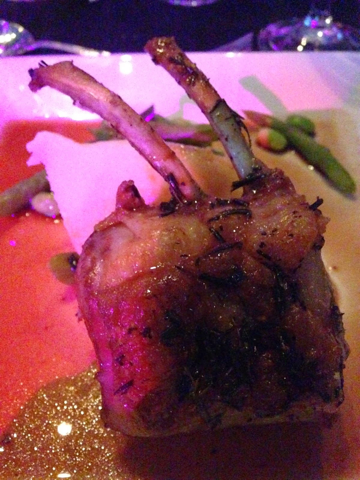 Main course Rosemary infused Cotswold rack of lamb first press olive oil mash, summer vegetables, bright well wine jus