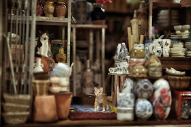 Detail of a modern dolls' house miniature Hong Kong ceramics shop.
