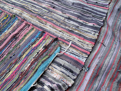 Colourful Rugs Form the Carpet in our Bedouin Tent