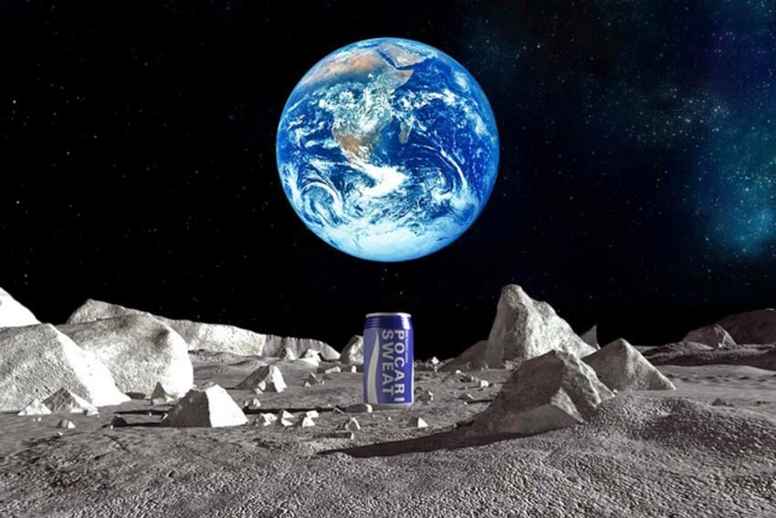 One step for can... 'Pocari Sweat' can depicted on the surface of the moon with Earth in the background.