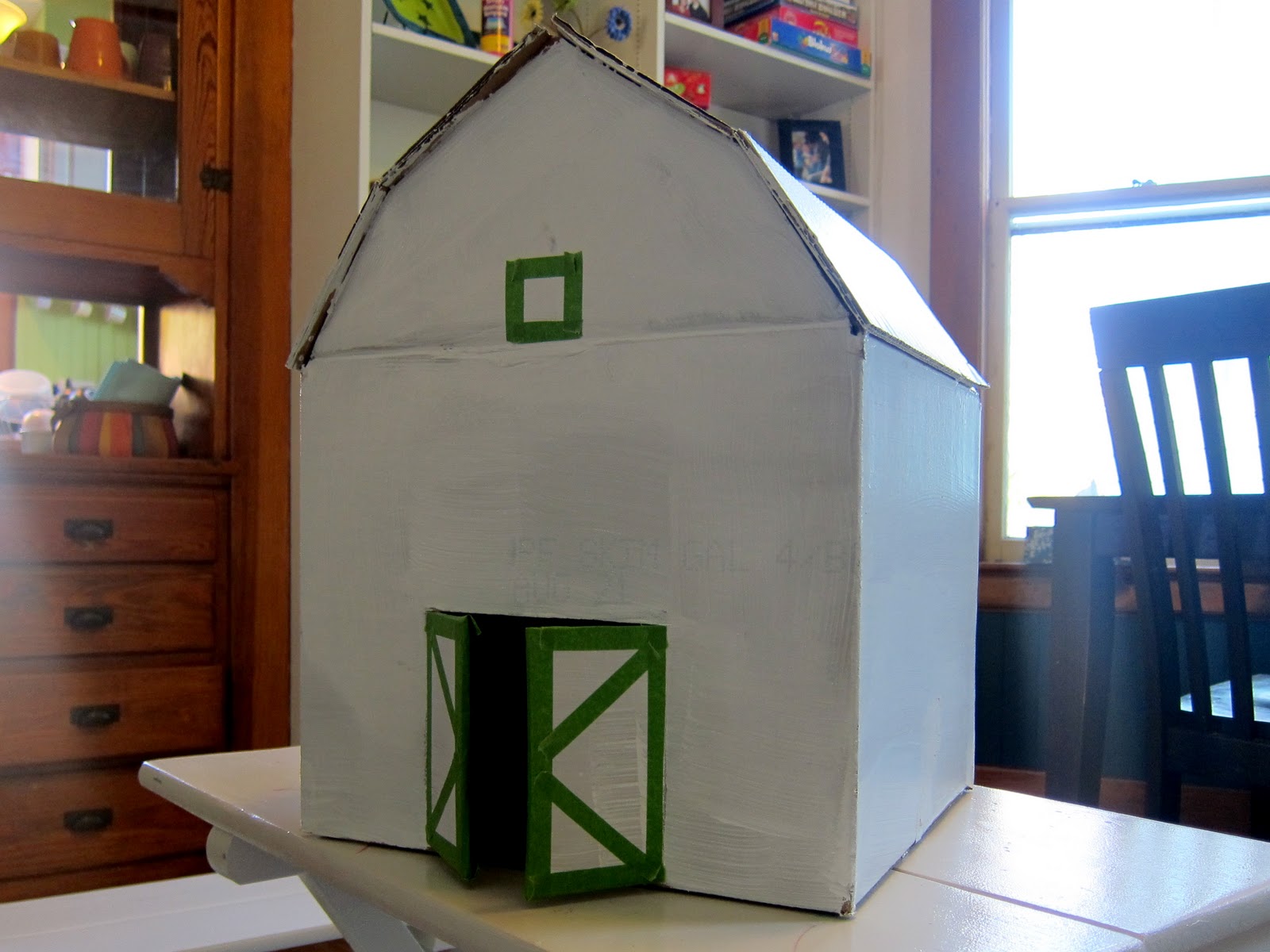 A Little Red Cardboard Barn