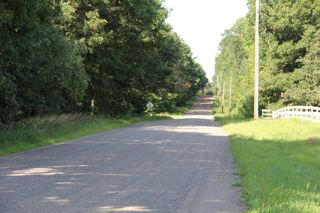 country road photo of a gravel road in the country