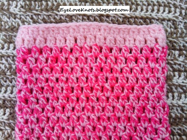 Use two strands of the sports weight yarn held together.