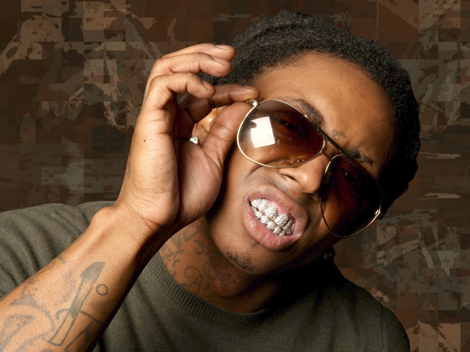 http://4.bp.blogspot.com/-lT8_D35OUdg/TuRsOcj57UI/AAAAAAAABLY/2y3Q9aZPjTk/s1600/Lil-Wayne-Wallpapers-2011-.jpg