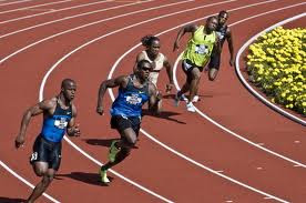 Guys running on a track