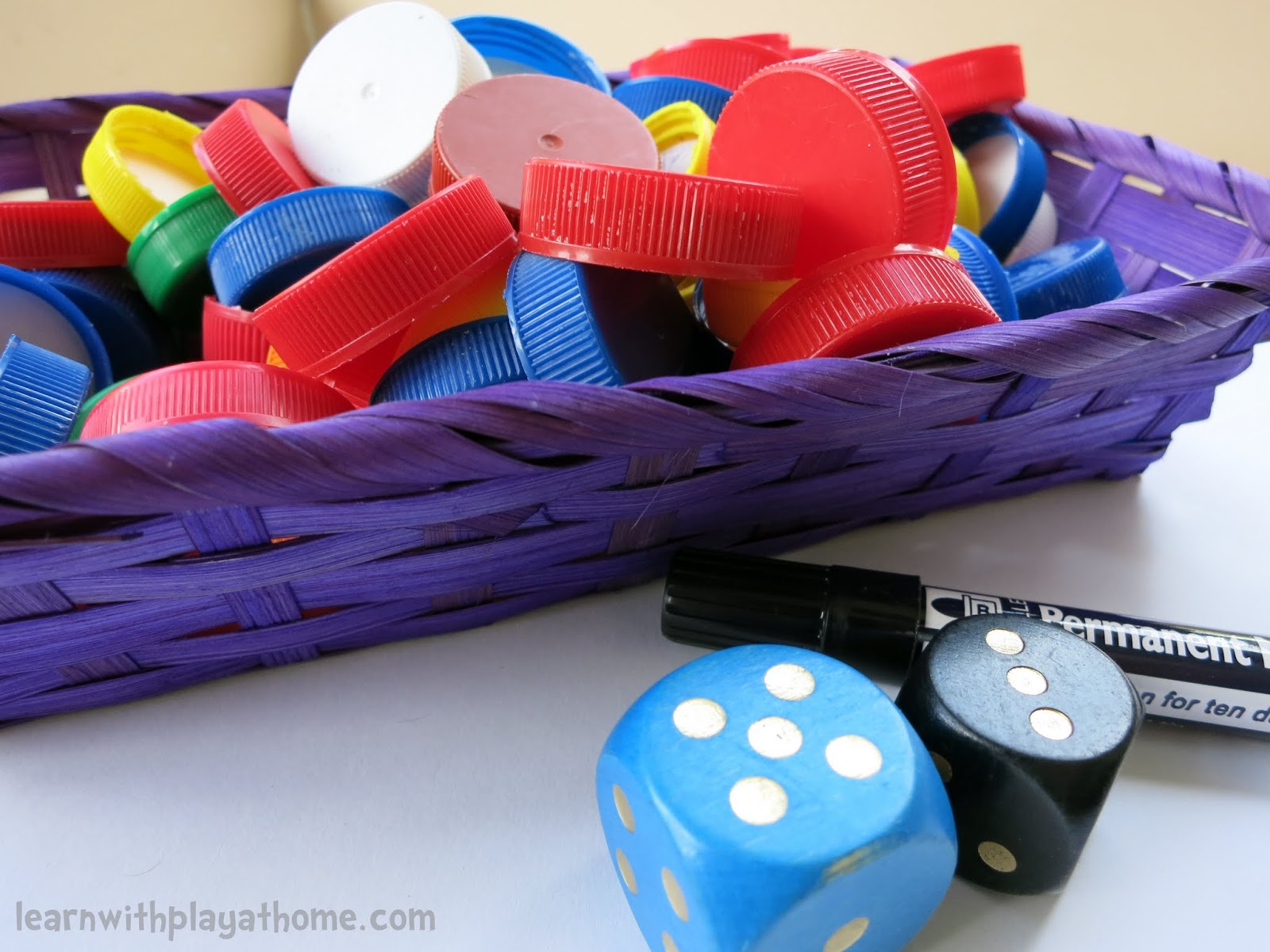 Learn with Play at Home Fun Bottle Top Addition Game. Playful Maths