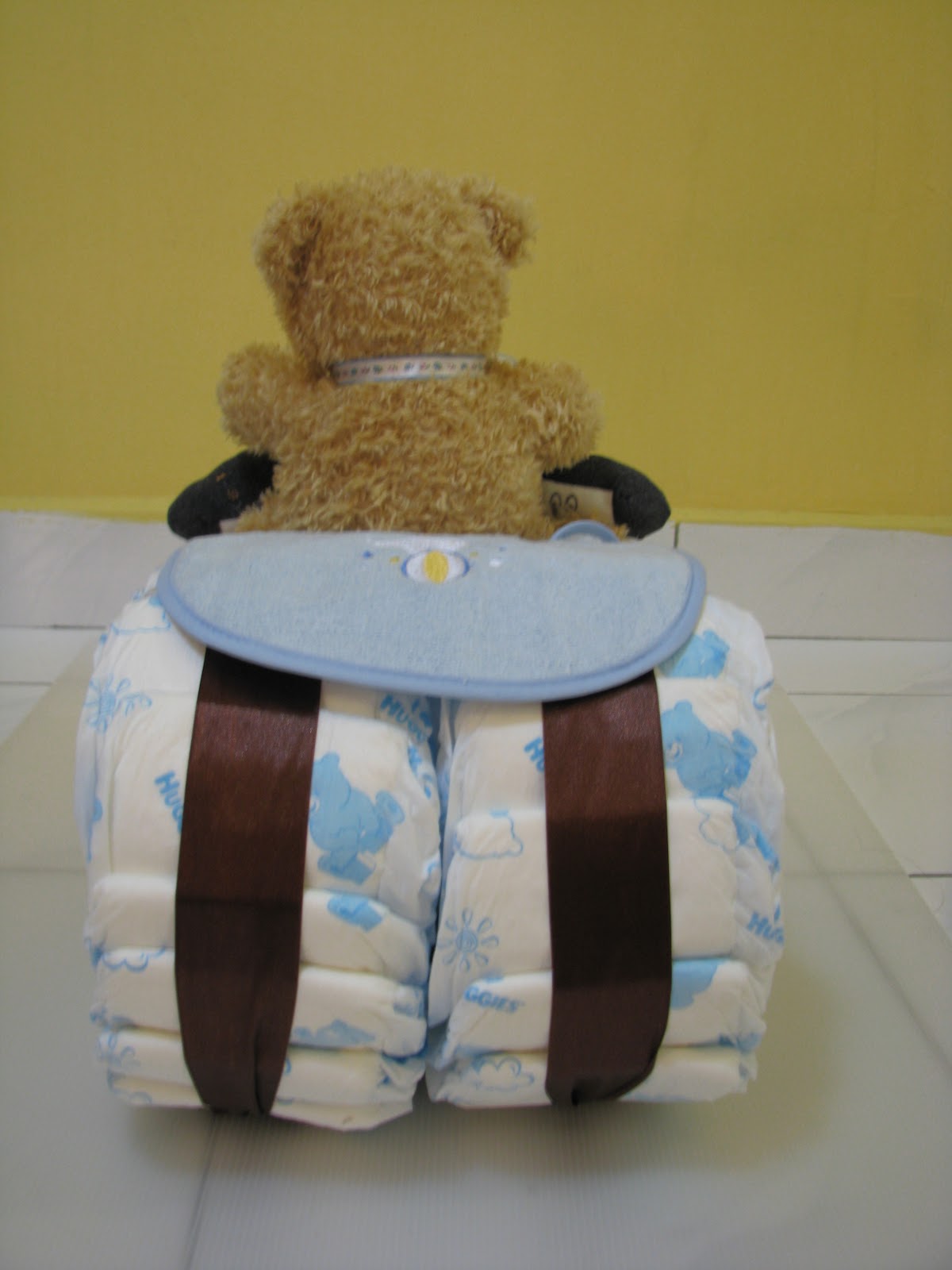L'abeille Bakes A Tricycle diaper cake for a handsome baby boy!