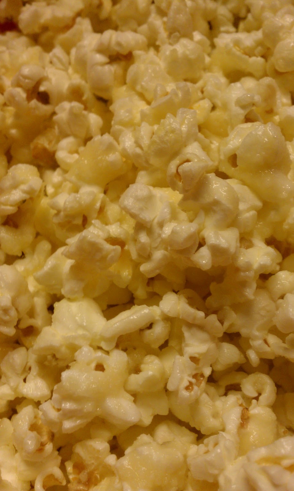 Here and There and Everything in Between Parmesan Cheese Popcorn!
