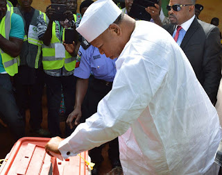 Abubakar Audu casting his vote on the eve of his death