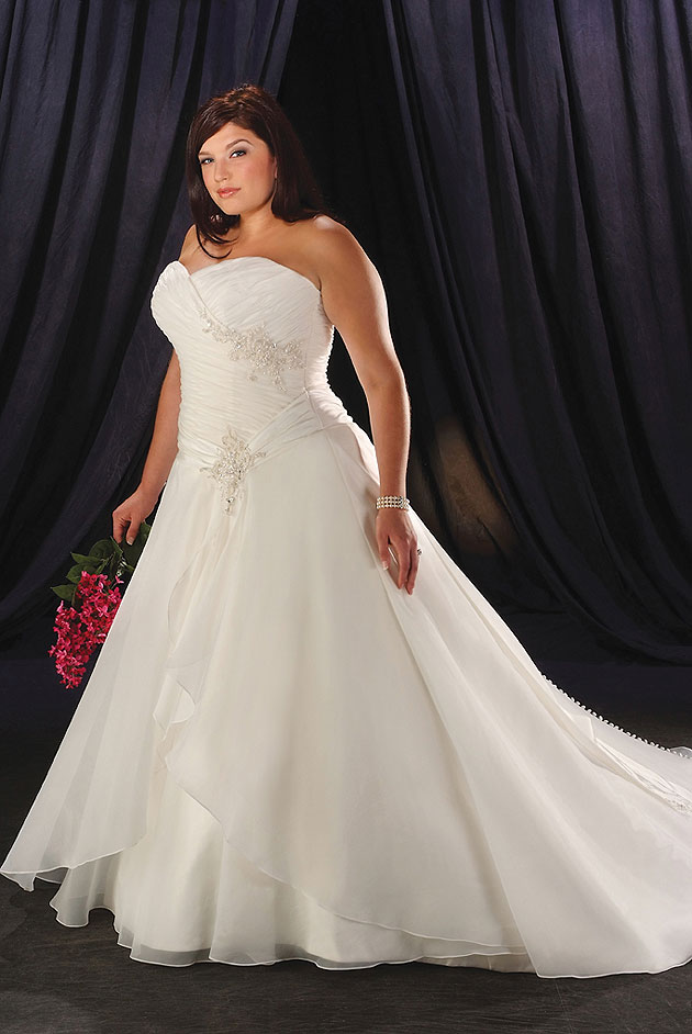Bride in a ballgown plus-size wedding dress