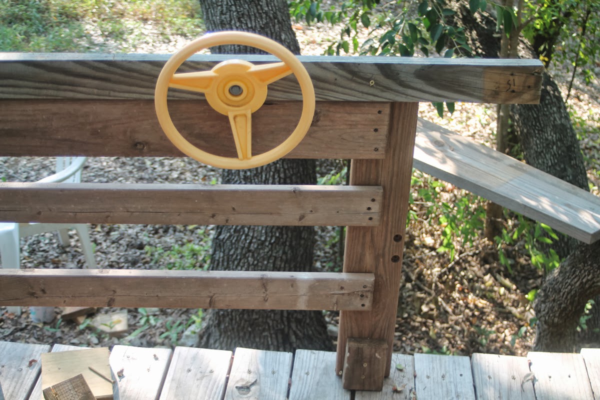Scavenged playscape steering wheel