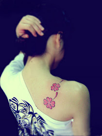 Flower tattoo on the shoulder