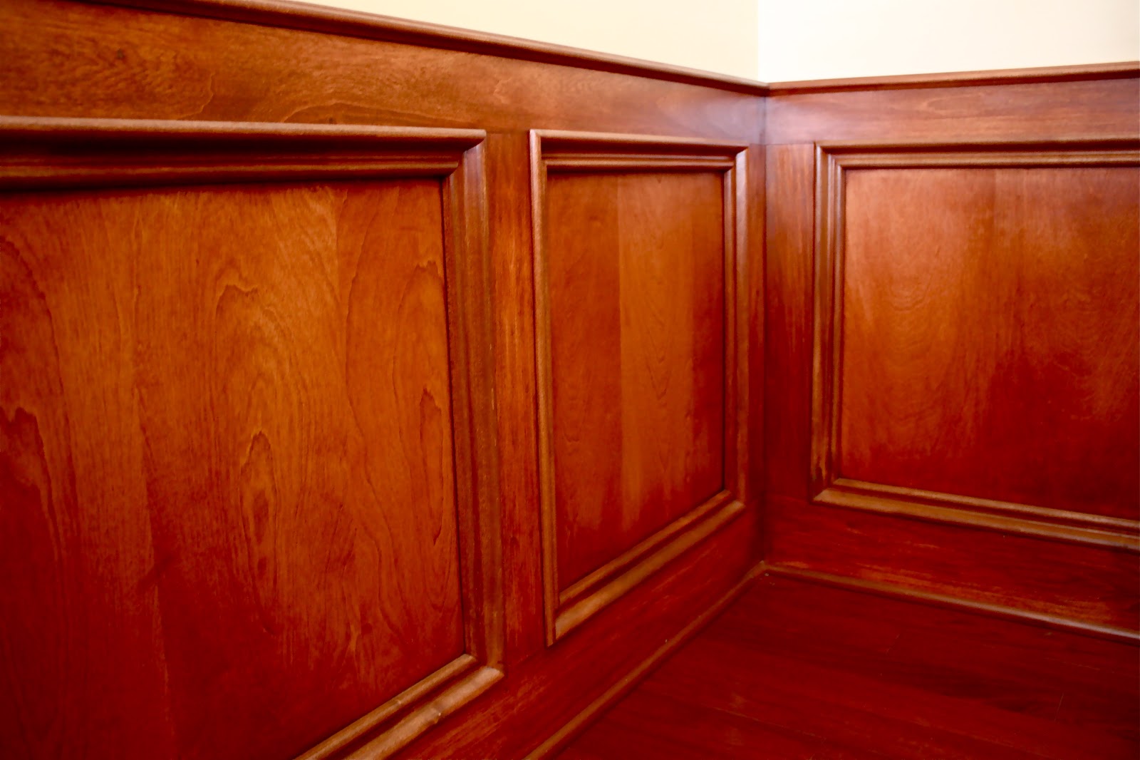 The Yellow Cape Cod Rich Wood Judges PanelingDen Makeover