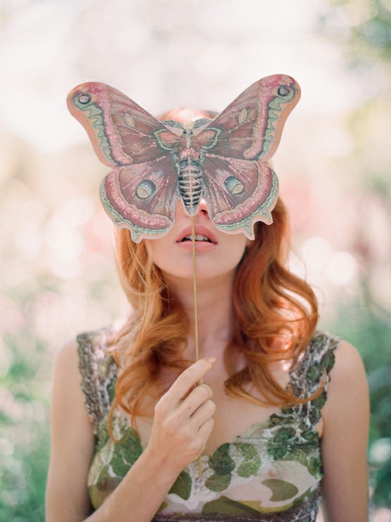 girl with butterfly mask