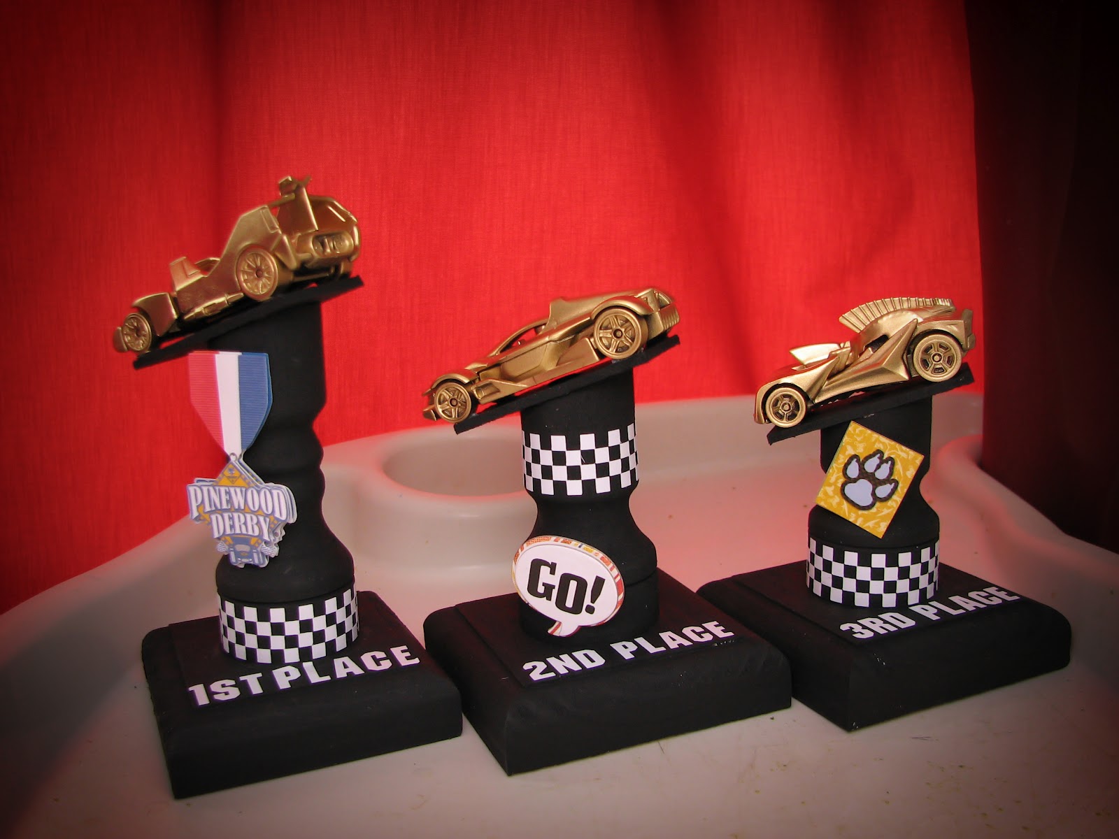 Going's on at the Glenn's Pinewood Derby Trophiies