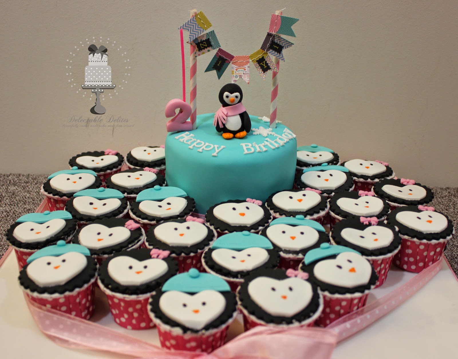 Delectable Delites Cute penguin cake + cupcake set