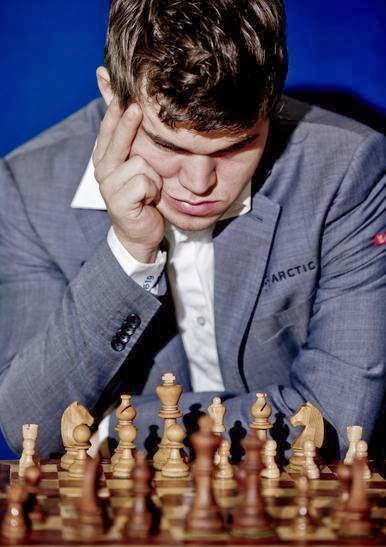 Campeão mundial de xadrez Magnus Carlsen conquista título e joga futebol em  Caxias do Sul