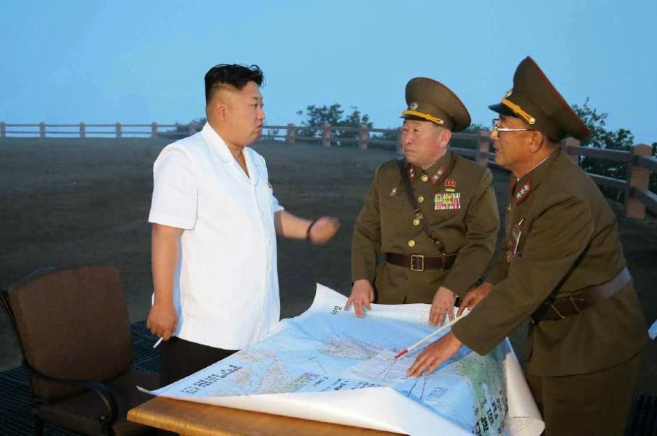 النشاطات العسكريه للزعيم الكوري الشمالي كيم جونغ اون .......متجدد  Kim+Jong+Un+witness+launch+of+North+Korean+Scuds+3