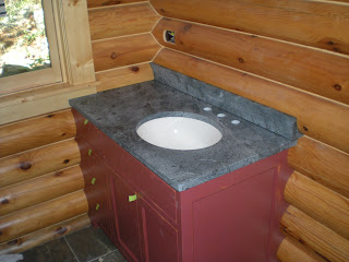 custom vanity with soapstone vanity top, https://huismanconcepts.com/