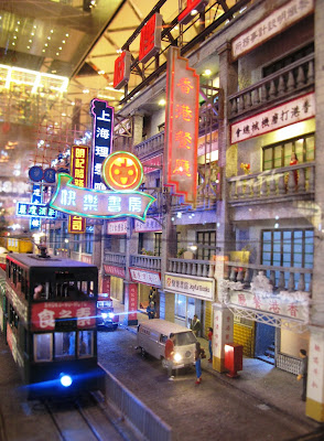 Model Hong Kong street scene with neon lights .